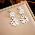 Elegant silver hollow daisy earrings in stainless steel on a champagne silk jewelry box - Double Layer Daisy Style (E5798 Steel Color)