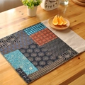 Linen placemat with mixed Japanese patterns like seigaiha on a wooden table - Patchwork Floral