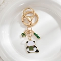 Detailed close-up of a panda and bamboo enamel keychain with a gold ring and lobster clasp - Back View Panda