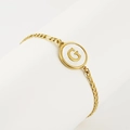 18K gold stainless steel bracelet with a round white shell pendant featuring the letter G - Letter G / Gold/White Shell