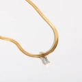 Macro shot of gold-plated snake chain with rectangle blue zircon pendant in 4-prong setting - 40+5cm / Blue Transparent