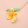 Handmade crochet yellow lily flower with green leaves on pink background - Finished Open Tulip Bouquet (light Yellow)