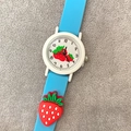 Close-up of kids quartz watch with blue silicone strap and 3D strawberry decor - Sky Blue