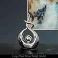 Modern abstract silver sculpture home decor with high-gloss mirror finish in large size - Morning Song Short Style Silver - Large