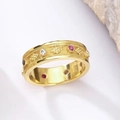 Vintage gold ring with colorful zircon inlay and intricate rope textured edges on white - US 7 / Gold