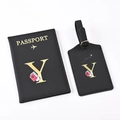 Detail of black PU leather passport holder and luggage tag with gold letter Y foil stamp - Black Letter Y