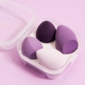Detail of 4-piece purple gradient makeup sponges set in a clear plastic storage box - 4-Grid Taro Purple Box