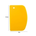 Yellow plastic bread slicer tool with 13.5x9cm dimensions for baking and cake leveling - D-shape Scraper / Yellow