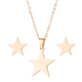 Detailed close-up of golden stainless steel star necklace and stud earrings jewelry set - 012 Gold