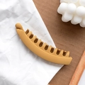 Minimalist matte ginger yellow banana hair clip with multi-tooth design on fabric - Yellow