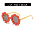 Cute sunflower shaped kids sunglasses in light red frame and round black lenses - Glossy Orange Red Frame Yellow Temple Grey Lens