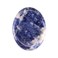 Polished oval dark blue crystal worry stone with white and orange marble texture - Blue Sodalite