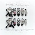 Gothic 3D bow press-on nails with luxury heart rhinestones in long trapezoid shape - Extra Small (XS)