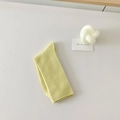 Pale yellow-green cotton blend crew socks with ribbed knitting in a folded display - Light Yellow