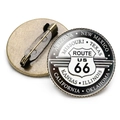 Macro view showing both sides of a vintage Route 66 crystal metal pin with bronze finish - Route US 66 Multi-State Edition