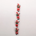 Christmas decoration featuring four 25cm Santa Claus dolls climbing a white rope ladder. - 25cm Four Person Ladder