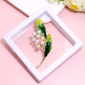 Elegant gold plant brooch featuring green leaves and white pearls in a minimalist design - XZ080-Plant Pearl-Boxed