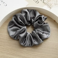 Dark grey satin scrunchie with a glossy silk finish on a white tray - Large Dark Gray