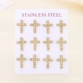 Set of twelve gold stainless steel cross earrings with inlaid crystals on white display card - Gold