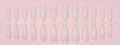 Detail of 24 translucent milky white almond shaped press-on nails on a layout strip - Translucent Milky White (SD-14)