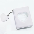 Detail of white mini photo album with heart-shaped cutout and silver bead chain pendant - Jelly Light Purple