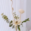 Dried flowers set with beige blossoms and eucalyptus in a glass vase for home decor - Mojito