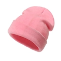 Close-up of pink knit beanie showing ribbed texture detail and wide folded cuff - Pink