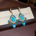 Detail of bohemian gold earrings with turquoise stones and blue beads in a gift box - 12# Glass Pearl Flower Waterdrop Tassel Drop Earrings (Blue Turquoise)