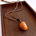 Handmade wooden tiger eye necklace with natural grain and braided cord on a tray - 12# Necklace-Brown-Moon (Wooden Oval)