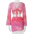 Detail of pink tie-dye mesh crop top with deep V-neck and bell sleeves co-ord set - S / Pink