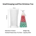Small pine tree silicone mold with a red and green Christmas tree candle, 9cm height - Weeping Pine-Small / White Semi-Transparent