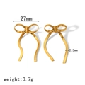 Detail of 18K gold bow earrings with dimensions 27mm width and snake chain texture - Gold Textured Bow Stud Earrings (TE6721-G)
