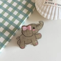 Cute cartoon elephant shaped acrylic hair claw clip with a charming pink bow detail - Elephant