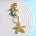 Llavero oceánico con estrella de mar dorada, cocotero y colgante de concha - Verde
