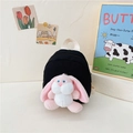 Mini black canvas backpack for kids featuring a plush pink bunny charm accessory - Black
