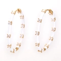 Exaggerated gold hoop earrings with white enamel coating and clear zircon stones inlay - Golden White