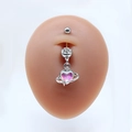 Silver belly button ring with heart planet charm and sparkling rhinestone on model - Planet