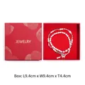 Detailed view of square red jewelry gift box measuring 9.4cm with interior display - Red Square Box with Gold Stamping