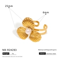 Detailed view of gold plated stainless steel flower ring with white pearl inlay specs - Exquisite Flower Style (NB-R24283)