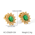 Macro view of gold vintage starburst earrings with green zircon and pavé crystals - Vintage Starburst Green Zirconia Stud Earrings (HC-E10609-GN)