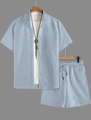 Detail of light blue men's short set showing the unique geometric waffle knit texture - Sky Blue
