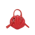 Red shell-shaped handbag with floral lace overlay and silver-tone metal hardware strap - Red
