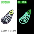 Luminous eggplant embroidery patch with purple finish showing day and night glow effect - Eggplant/GZ-05548-3