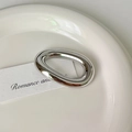 Polished silver stainless steel oval brooch displayed on a minimalist white ceramic tray - 5# Silver O-Shape Brooch