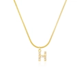 Close-up of a gold snake chain necklace with a sparkling diamond-encrusted H letter pendant - Letter H