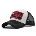 Close-up of 3D Style embroidery on black and white mesh trucker hat with decorative stitching - White