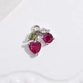 Macro shot of silver cherry pendant with red heart crystals and green leaf stones - VD1657 White Gold Rose Red Zircon Heart Cherry