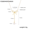 Golden stainless steel bow necklace with dangling imitation pearls and Y-shaped chain - Gold