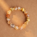 Elastic beaded bracelet with yellow strawberry quartz, gold spacers, and sparkling zircons - Yellow Tower Crystal Tiger Eye White Crystal Zircon Round Bead Style