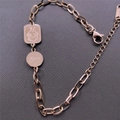 Pulsera de acero inoxidable oro rosa con dijes de ángel de la suerte y medallas - Oro rosa